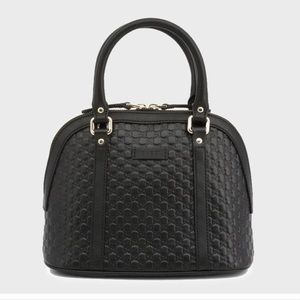 Gucci MicroGuccissima black dome crossbody bag
